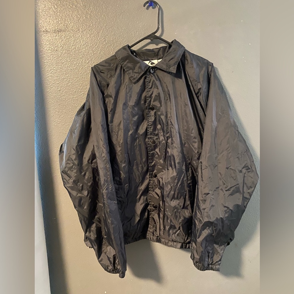 Black wind breaker size large chingona on back